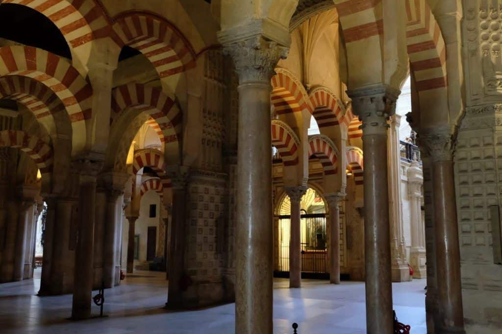 Córdoba Roman bridge and Mezquita at sunset — day trip from Málaga