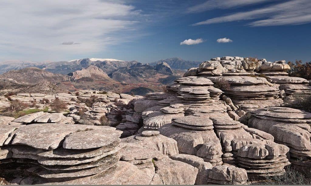Stone formations in a mountainous landscape, perfect for Costa Excursions tours.