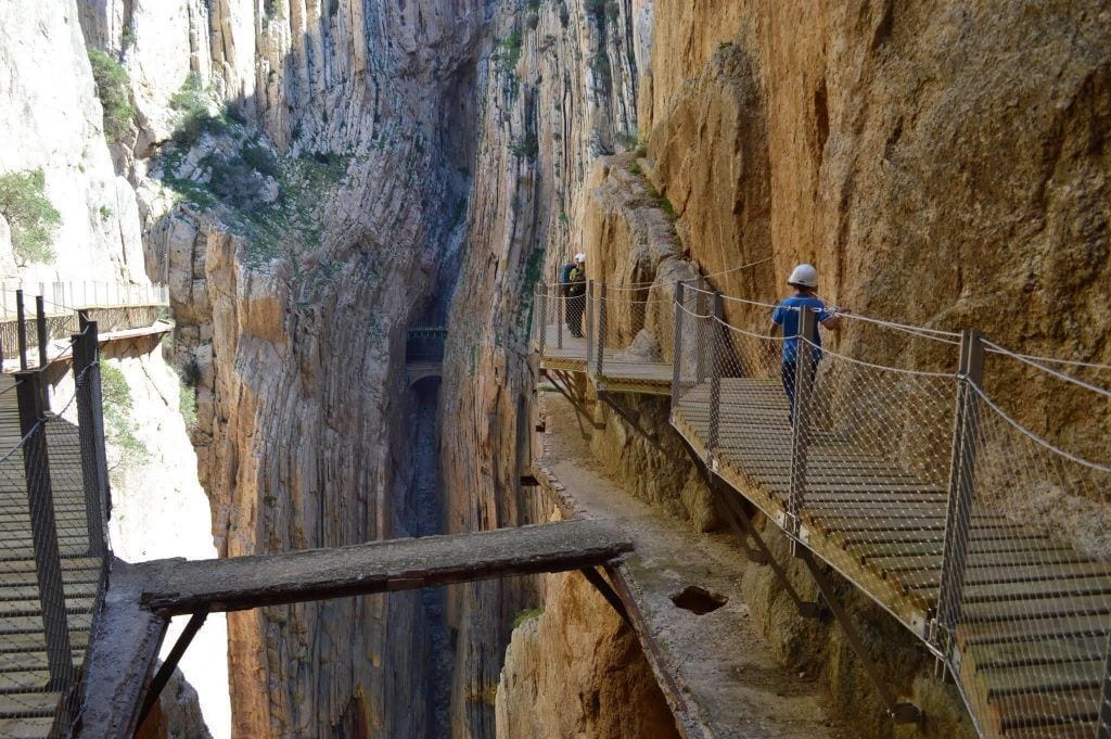 Spectacular view of Caminito del Rey walkway along steep canyon walls.