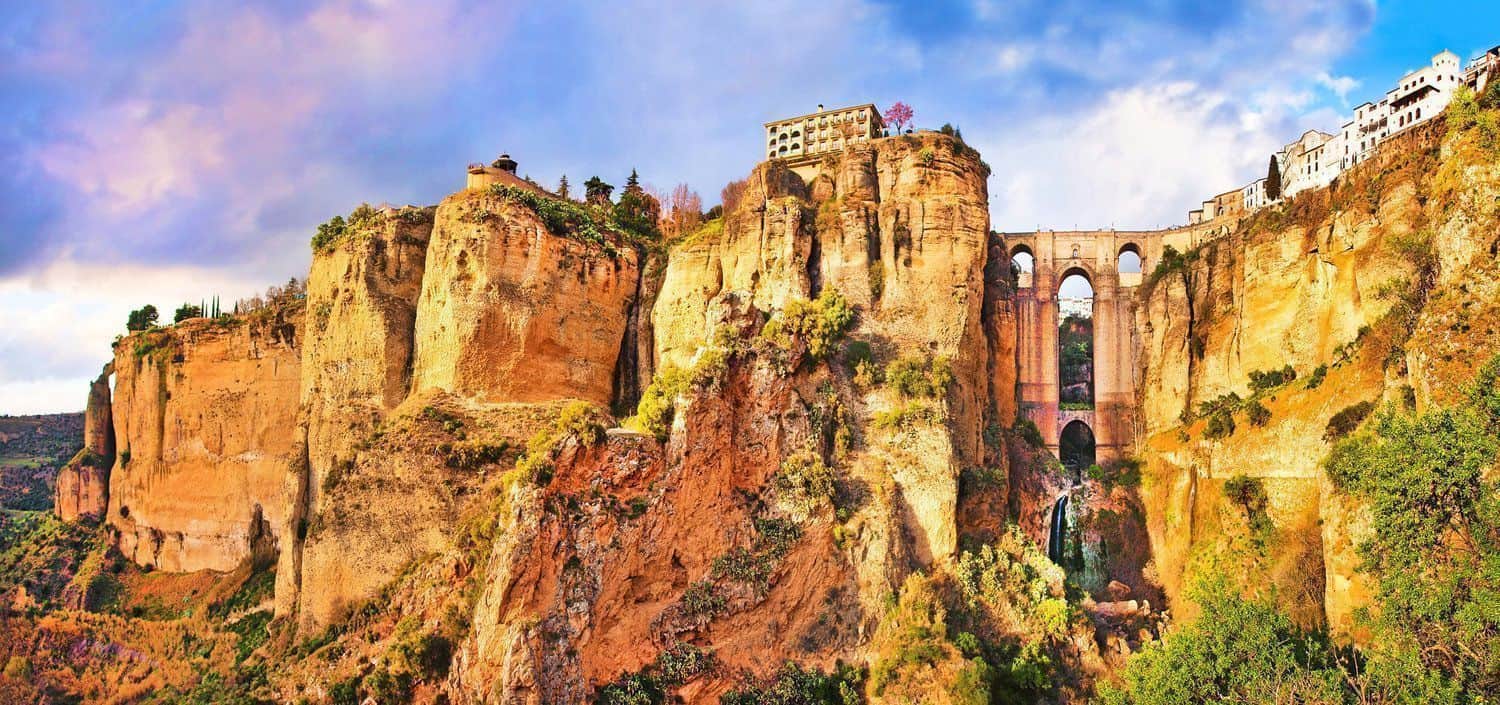 Small private group exploring Ronda old town on a Costa Excursions day trip
