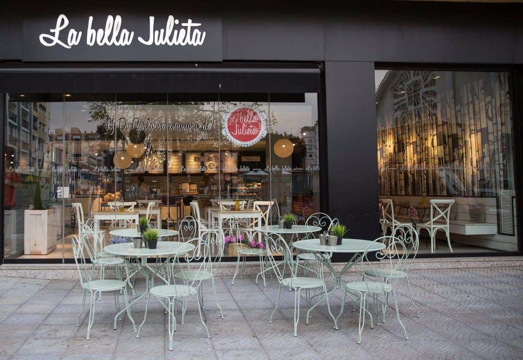 Outdoor seating at La Bella Julieta restaurant in Malaga.