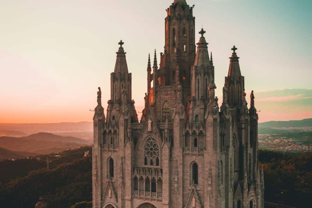 Castle of the Holy Cross, Spain, sunset, historic landmark, tourism.