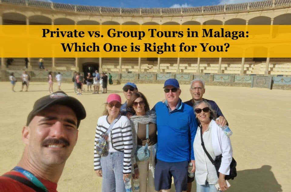 Group tour in Malaga with tourists enjoying a sunny day at a historic site.
