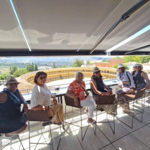 Panoramic view terrace with women relaxing during Costa Excursions tour.