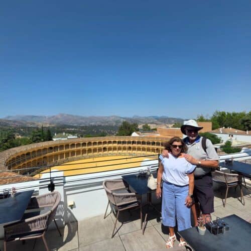 Rooftop terrace with panoramic views of the city and mountains in Costa Excursions.