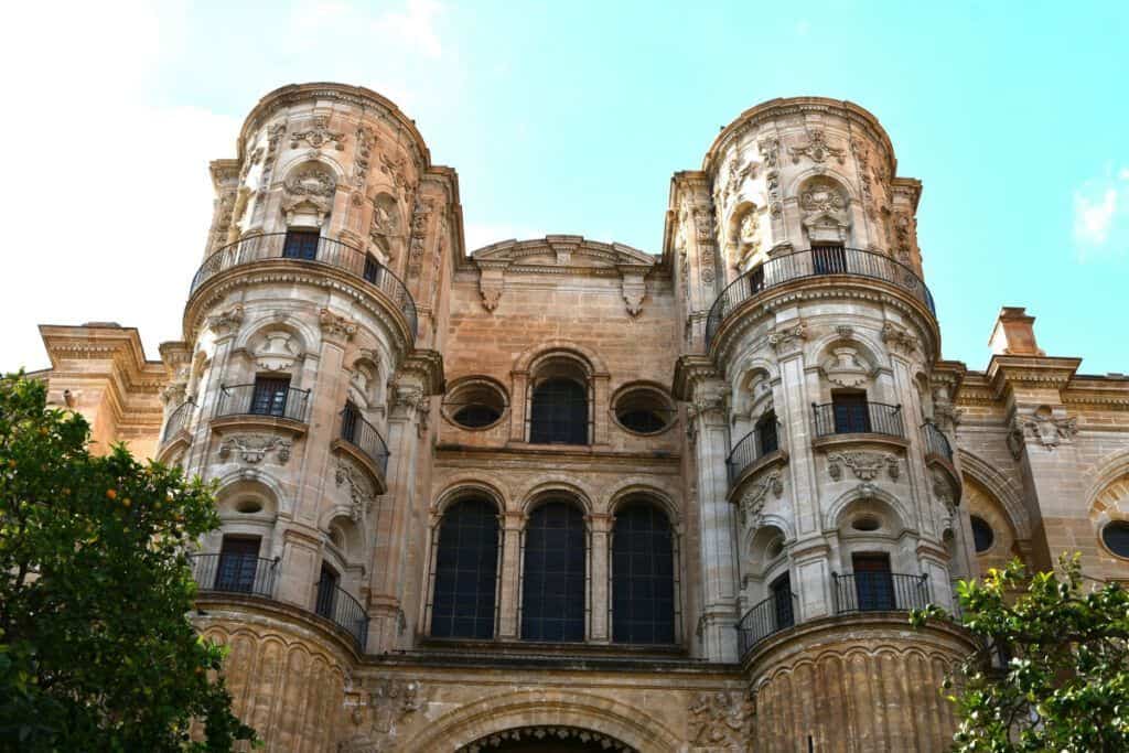 Malaga Picasso Museum historic facade with ornate architecture and towers.